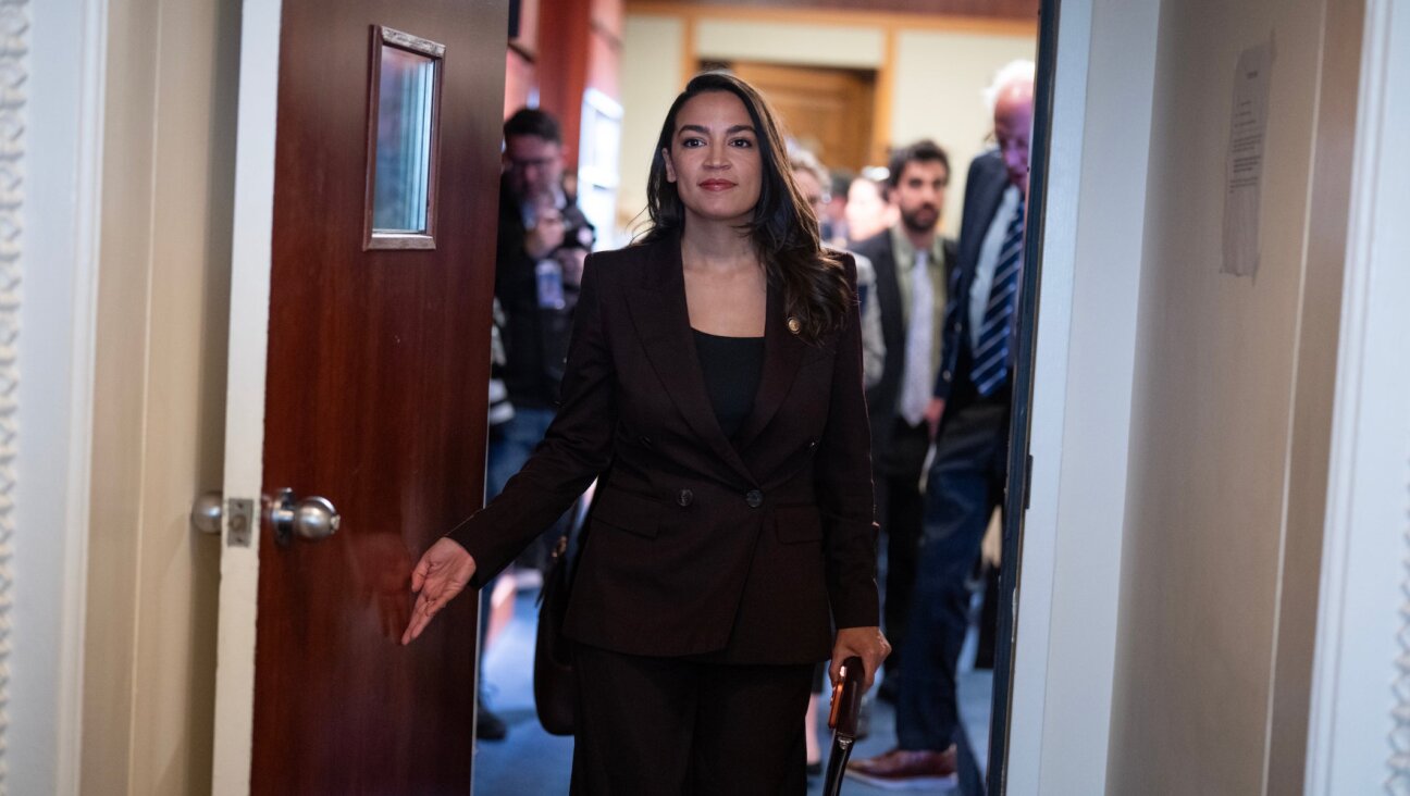 Rep. Alexandria Ocasio-Cortez, D-N.Y., and Sen. Bernie Sanders, I-Vt., conclude a news conference announcing the Artificial Intelligence Data Center Moratorium Act in the U.S. Capitol on Wednesday, March 25, 2026. The legislation aims to “ensure that AI benefits workers, is safe and effective and does not harm communities or destroy the environment.” (Tom Williams/CQ Roll Call)