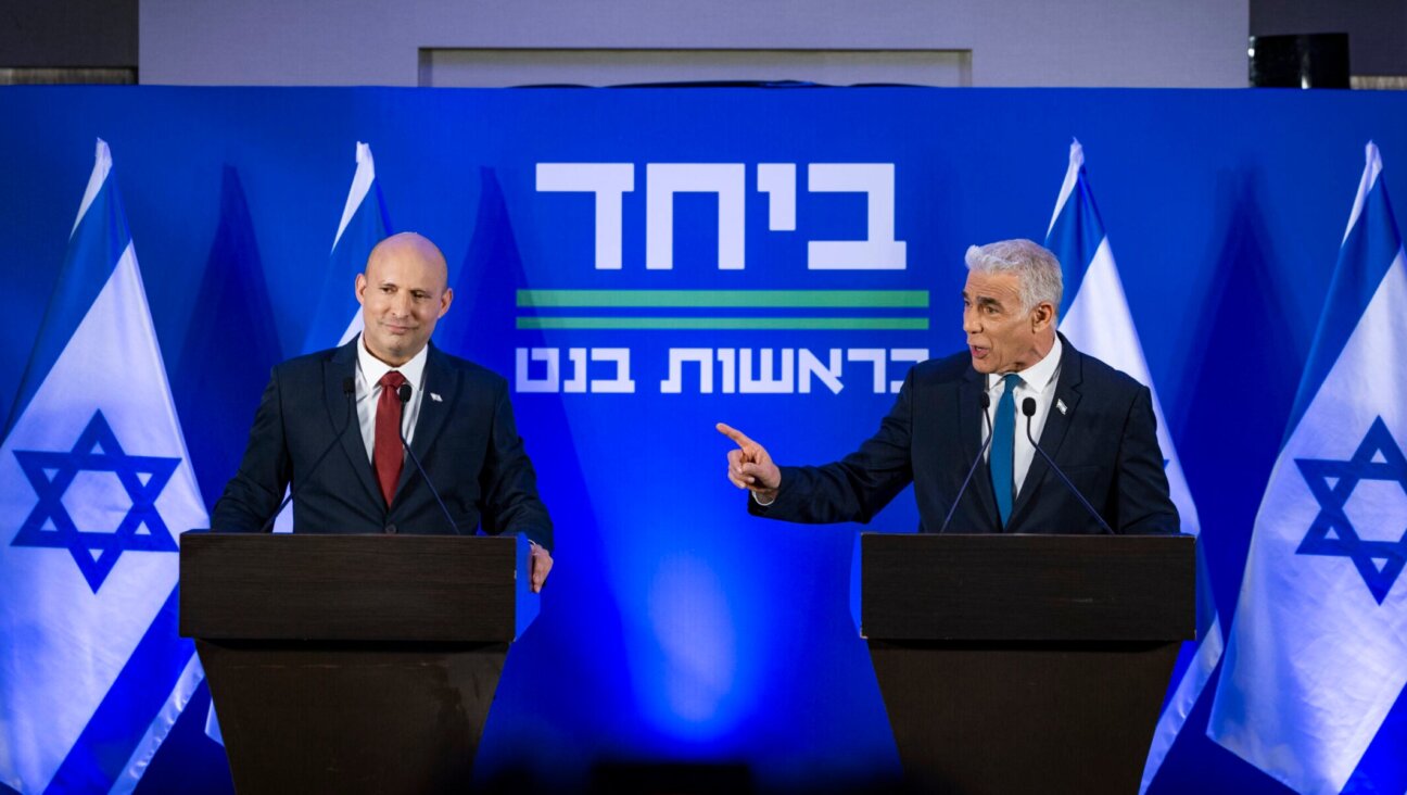 Opposition Leader and Head of the Yesh Atid party Yair Lapid and former Prime Minister Naftali Bennett speak during a press conference announcing a joint list named “Together” ahead of upcoming elections, to be led by Bennett, in Herzliya, Israel, April 26, 2026.