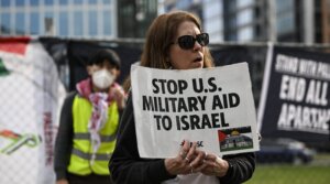 Protesters demonstrate outside the headquarters of AIPAC, the American Israel Public Affairs Committee in Washington, D.C., March 13, 2024. 