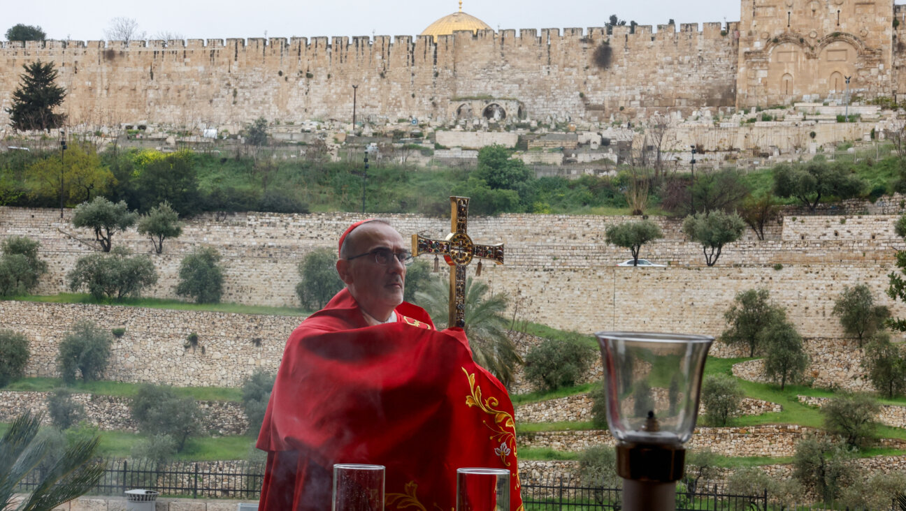 Latin Patriarch of Jerusalem, Cardinal Pierbattista Pizzaballa, leads a prayer service to mark Palm Sunday in Jerusalem on March 29, 2026, following the cancellation of the traditional Palm Sunday procession.