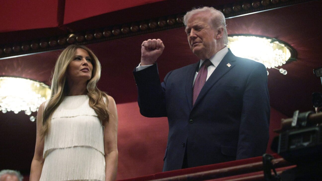 President Donald Trump and first lady Melania Trump arrive at the Opera House of the Kennedy Center for the opening night performance of the musical "Chicago" on March 31, 2026 in Washington, D.C.