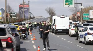 Police stand by a cordoned-off area outside a building that houses the Israeli Consulate after gunman opened fire on April 7, 2026 in Istanbul, Turkey.