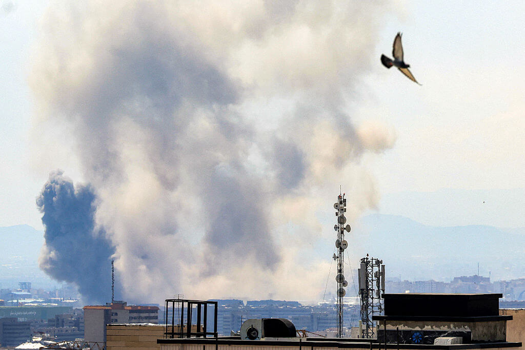 Smoke rises following strikes on Tehran on April 7.