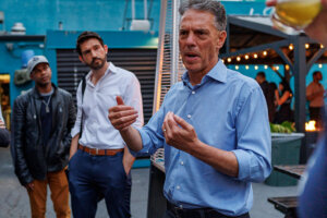 Mayoral candidate Adam Miller speaks with a small group of constituents in Los Angeles on April 9, 2026.
