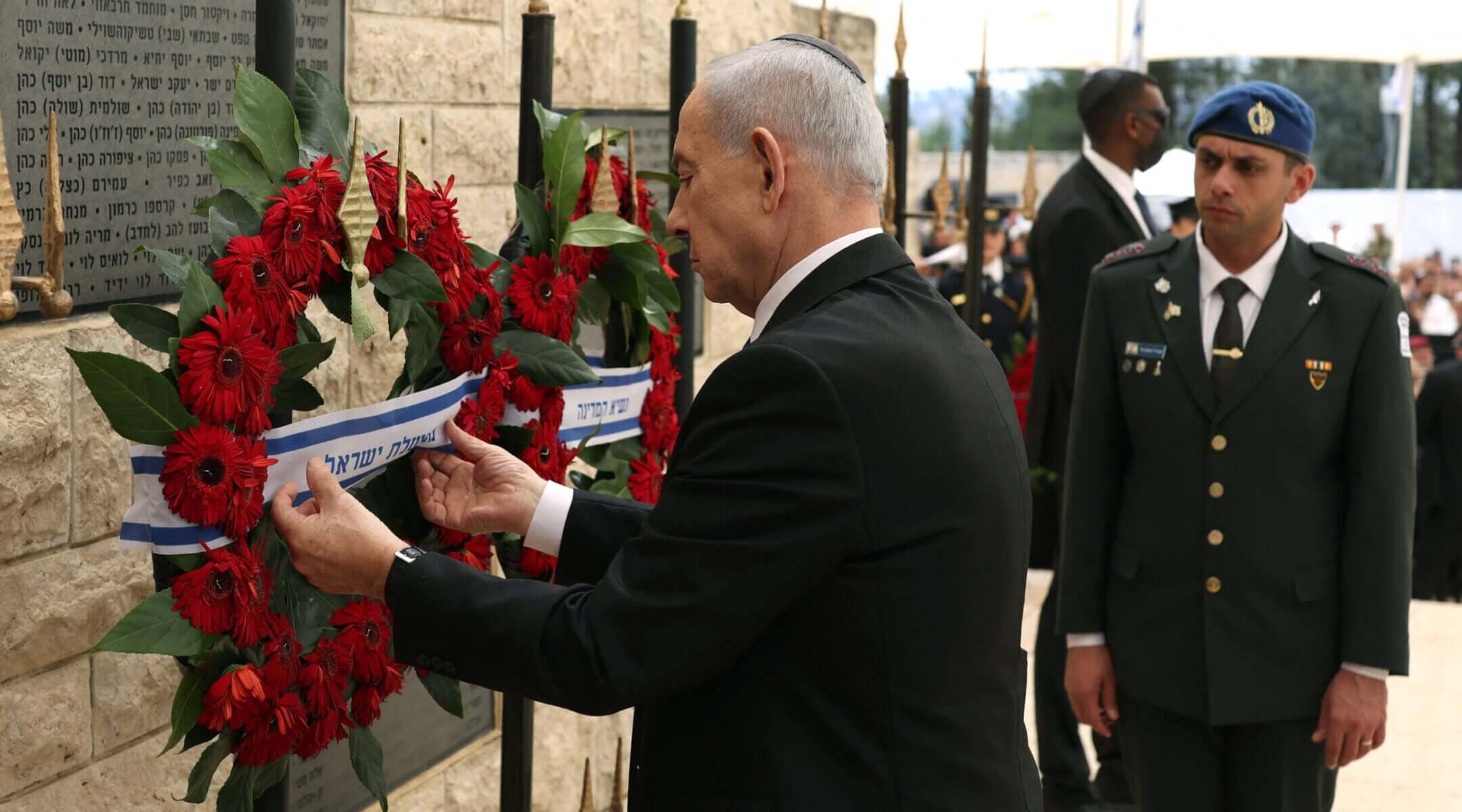 Israeli Prime Minister Benjamin Netanyahu places a wreath during a ceremony marking Israel’s Memorial Day for fallen soldiers at the military cemetery on Mount Herzl in Jerusalem, April 21, 2026. (Ilia Yefimovich / Pool / AFP via Getty Images)