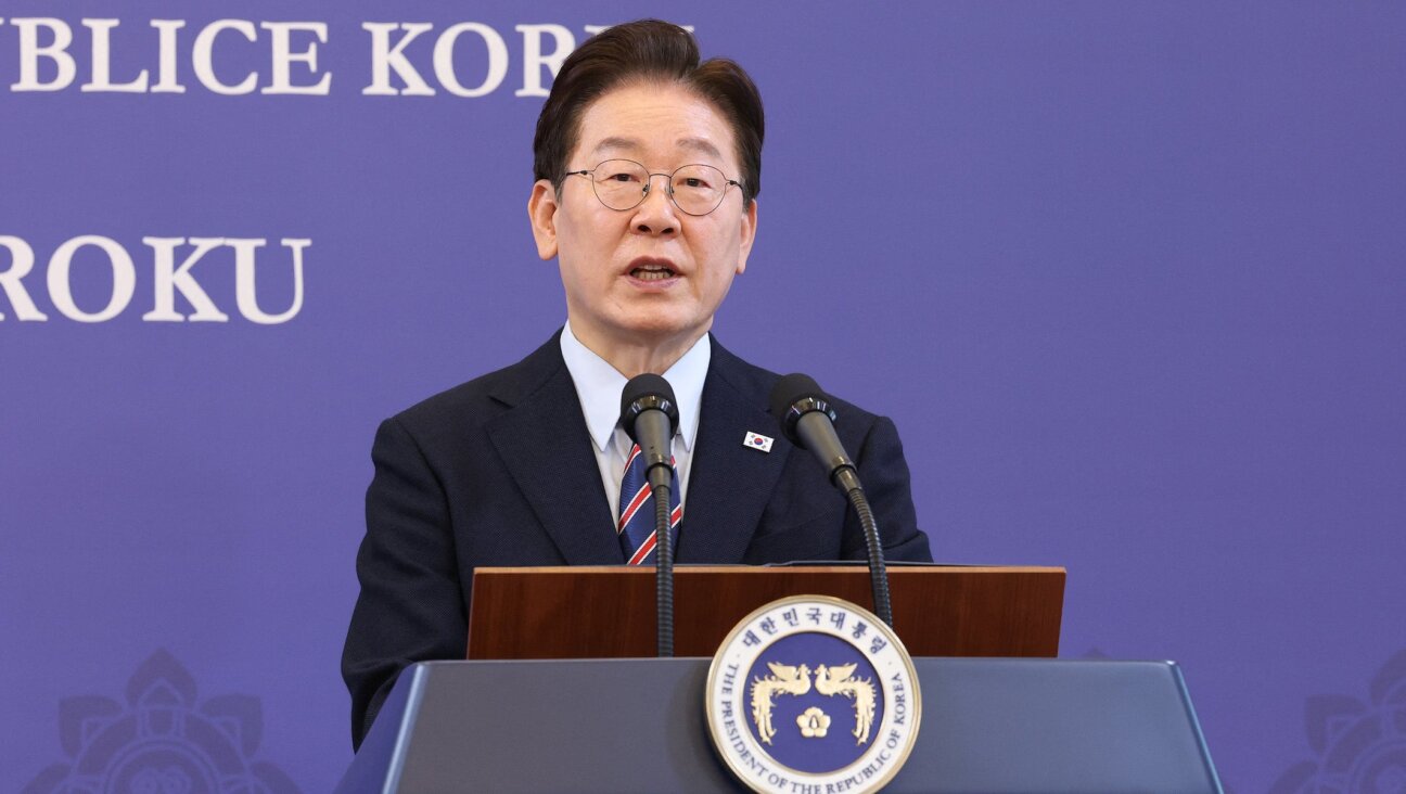South Korean President Lee Jae Myung speaks during a joint press conference with Poland’s Prime Minister Donald Tusk at the presidential Blue House in Seoul on April 13, 2026. (Chung Sung-Jun / POOL / AFP)