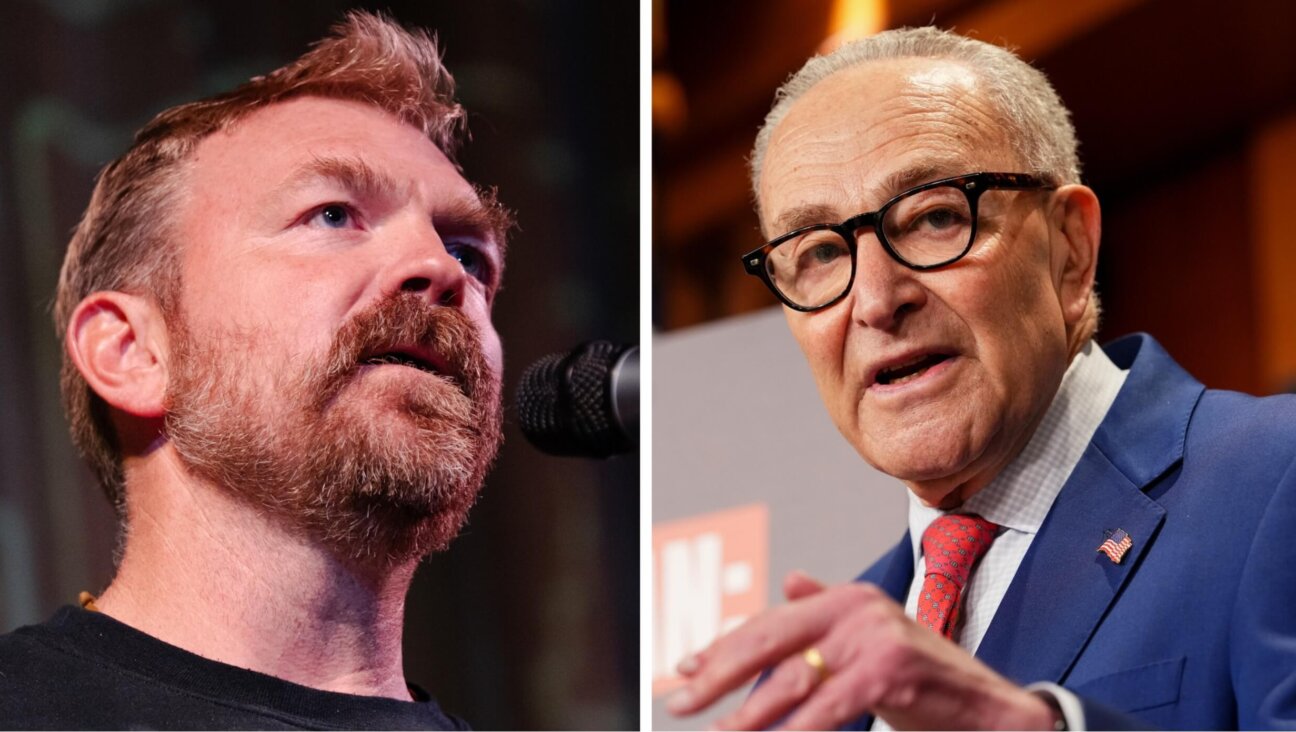 (R to L) Senate Minority Leader Chuck Schumer and Graham Platner, a Senate candidate from Maine. 