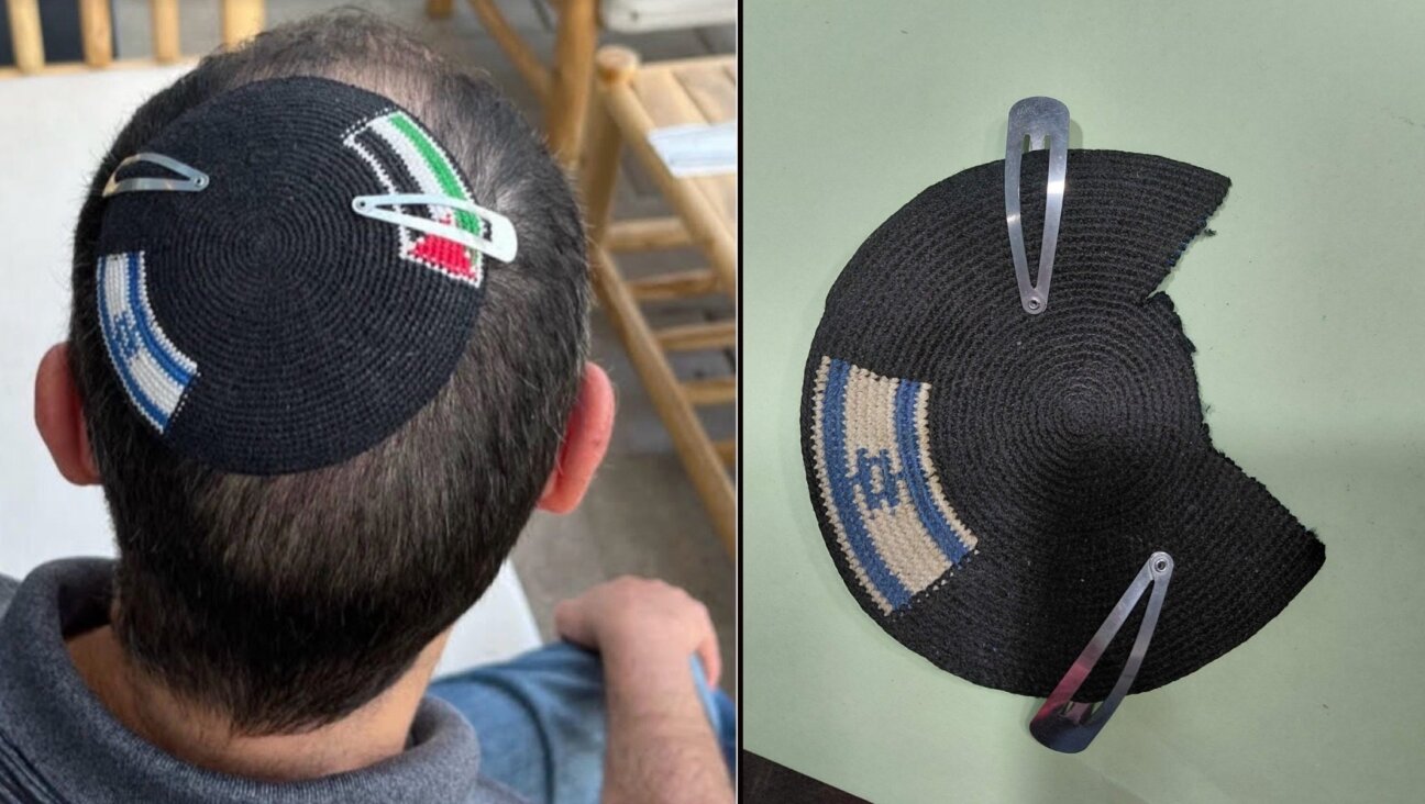Alex Sinclair wore a kippah showing the Israeli and Palestinian flags for years, until he said a police officer took it from him and cut off the Palestinian flag in April 2026.