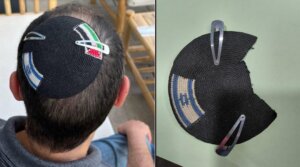 Alex Sinclair wore a kippah showing the Israeli and Palestinian flags for years, until he said a police officer took it from him and cut off the Palestinian flag in April 2026.