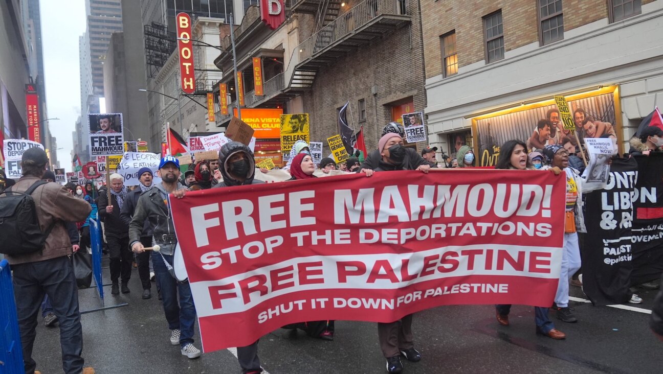 Pro-Palestinian New Yorkers gather in Times Square and demand the release of Mahmoud Khalil, Badar Khan Suri, Rumeysa Ozturk, Yunseo Chung, and others on Saturday, April 12, 2025, just a day after an immigration judge in Louisiana ruled that the Trump administration can deport him. (Selcuk Acar/Anadolu via Getty Images)