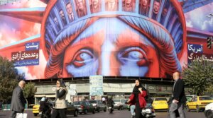 A poster is hung in Tehran’s Revolution Square featuring an image of the Statue of Liberty, and photographs of several heads of state to mark the 46th anniversary of the U.S. Embassy takeover and hostage crisis in Tehran, Iran on November 5, 2025. 