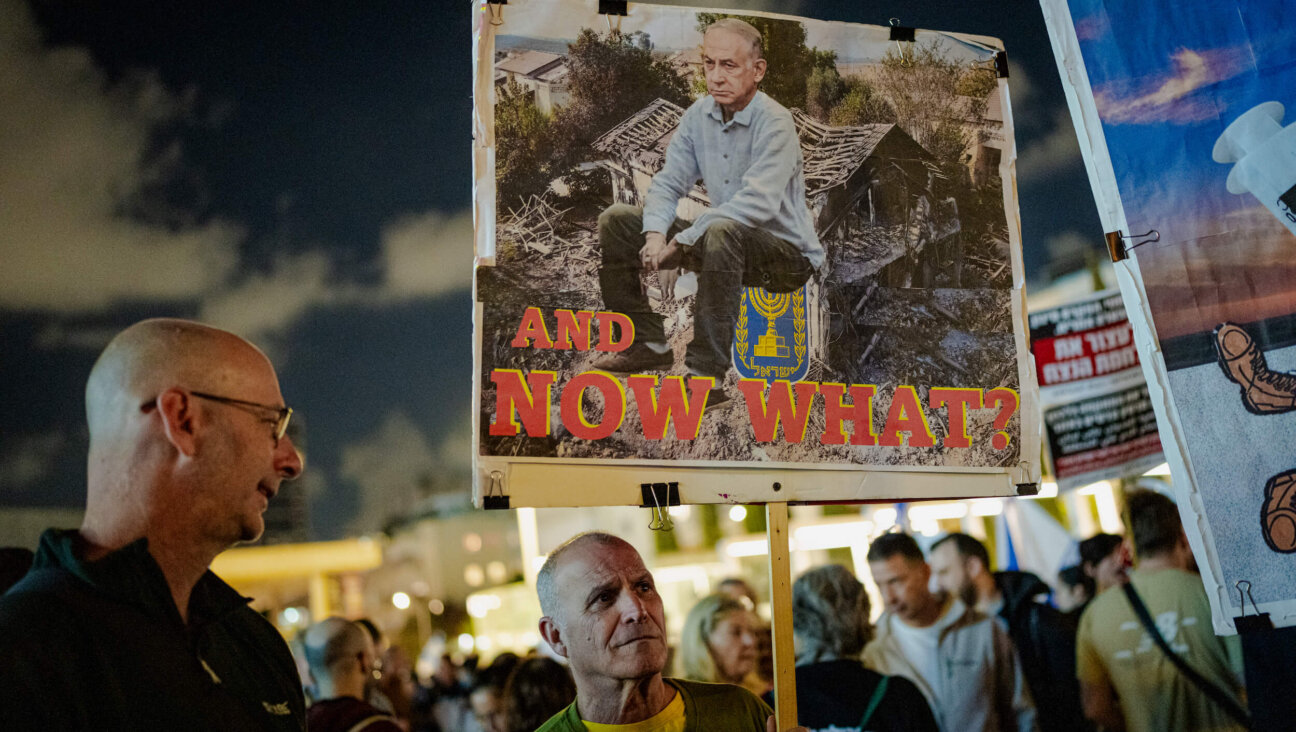 Left wing demonstrators protest against war and the Israeli government on April 11 in Tel Aviv.
