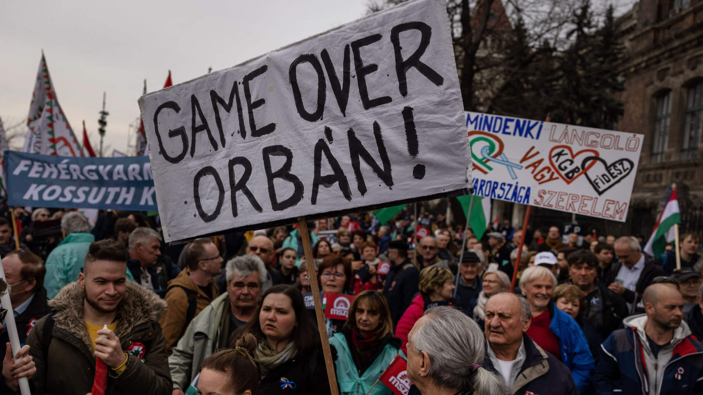 A protester holds an anti-Orbán placard during a demonstration in Budapest, Hungary on March 15, 2022.