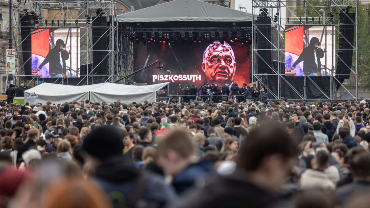 A screen shows Hungarian Prime Minister Viktor Orbán's face during an anti-government concert two days ahead of parliamentary elections in Budapest, Hungary on April 10.
