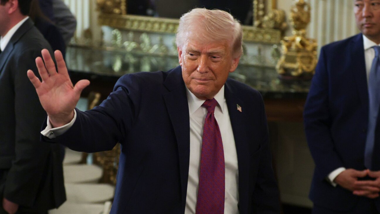 President Donald Trump departs after making remarks during a NCAA Collegiate National Champions Day event in the State Dining Room at the White House on April 21, 2026 in Washington, DC. (Alex Wong/Getty Images)