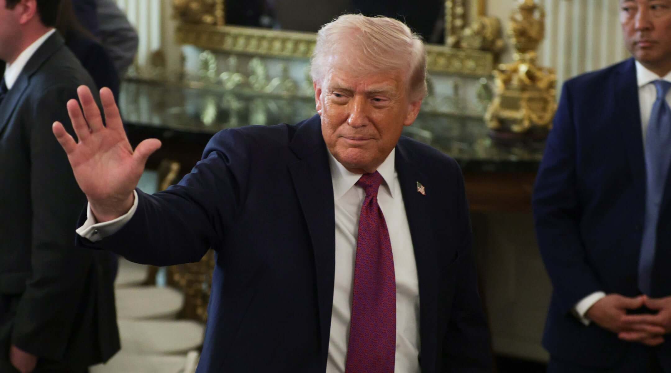 President Donald Trump departs after making remarks during a NCAA Collegiate National Champions Day event in the State Dining Room at the White House on April 21, 2026 in Washington, DC. (Alex Wong/Getty Images)