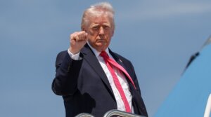 President Donald Trump gestures as he boards Air Force One on April 16, 2026 at Joint Base Andrews, Maryland.