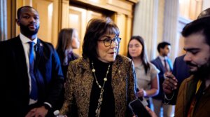 Sen. Jacky Rosen walks into the Senate Chamber on December 11, 2025 in Washington, D.C.