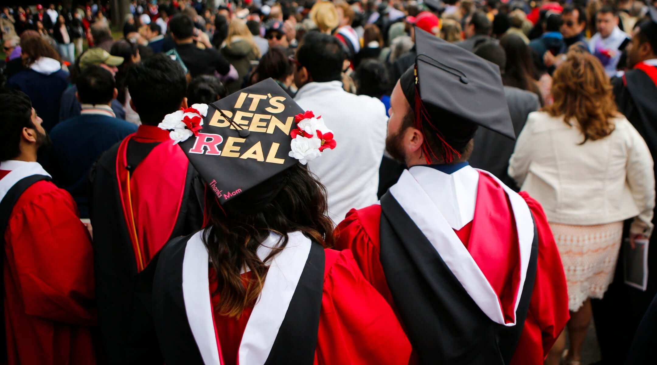 Graduates and guests of Rutgers University graduation exit the ceremonies.