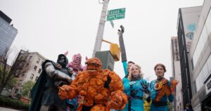 Cosplayers honor Jack Kirby after the unveiling of Jack Kirby Way.