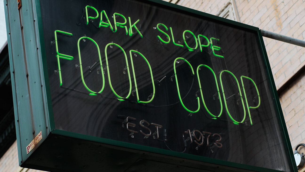 The iconic sign outside the cooperative grocery store.