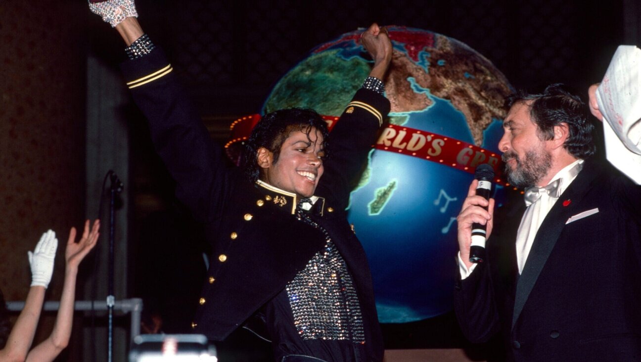 Walter Yetnikoff, president of CBS records, and Michael Jackson celebrate at the Guinness Book of World Records party honoring Michael Jackson for the top selling solo album in history at the Museum of Natural History on Feb 8, 1984.