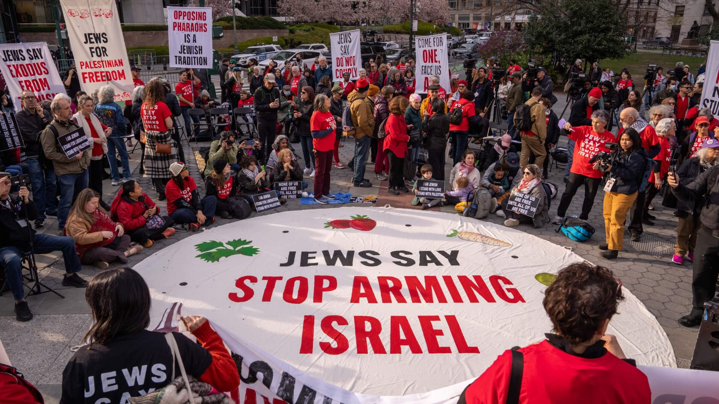 Demonstrators from the group Jewish Voice for Peace hold an emergency Passover Seder outside of ICE headquarters on April 14, 2025 in New York City.