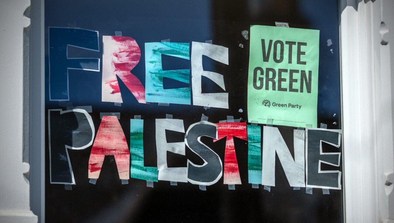 A Green Party poster is displayed in a window in London on April 29, 2026.