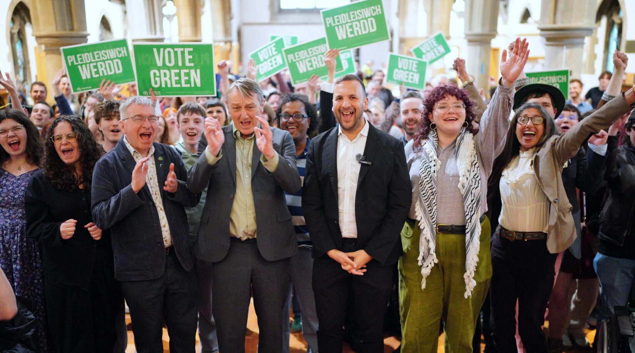 Green Party leader Zack Polanski (center) with party candidates and supporters after making a speech at the Church of Saint John The Evangelist in Cardiff, Wales, ahead of local elections, May 2, 2026. (Ben Birchall/PA Images via Getty Images)