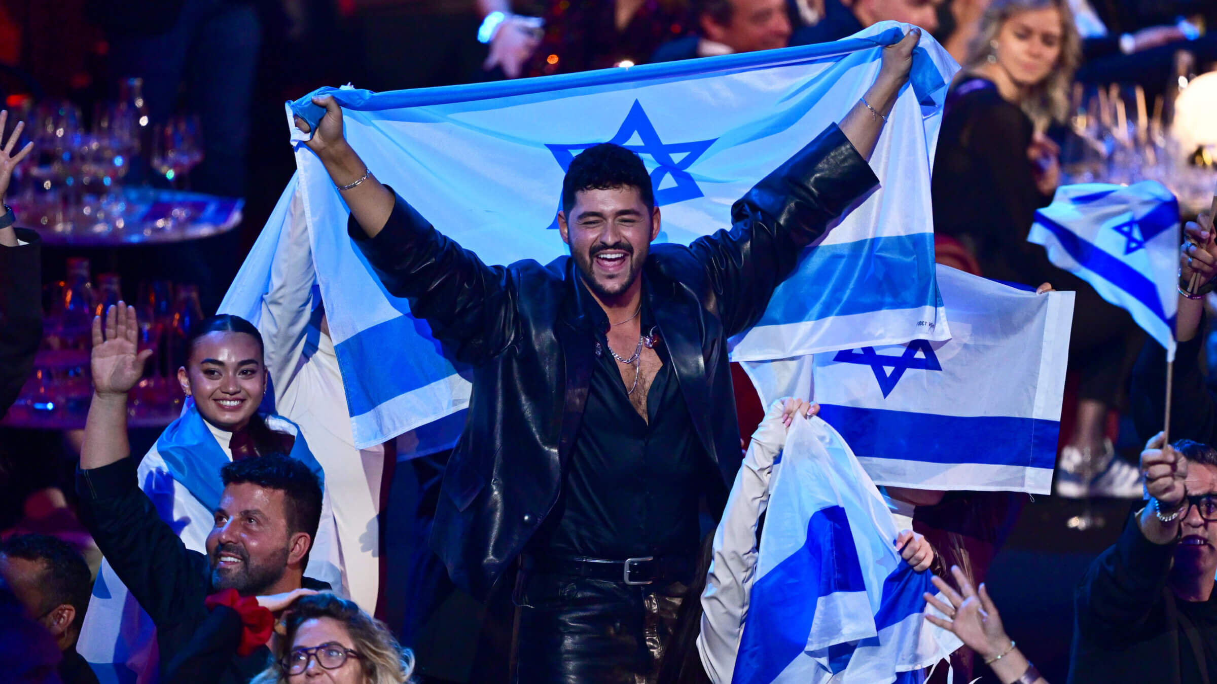 Noam Bettan celebrates during Eurovision. 