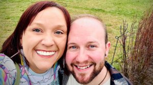 James Glick (R) and his wife, Gypsy Vickers (L) pose in a Minneapolis park after moving from Texas through a “Move to Thrive” loan. (Courtesy of James Glick)