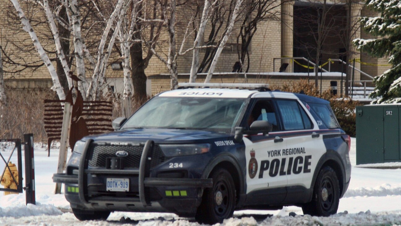 A York Regional Police vehicle is seen outside the Beth Avraham Yoseph of Toronto synagogue following gunshots fired at the building in Vaughan, Ontario, Canada, Mar. 14, 2026. (Creative Touch Imaging Ltd./NurPhoto via Getty Images)