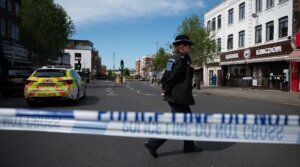 British police investigate the scene after two people were injured in a stabbing attack in the Golders Green area of north London on April 29, 2026. (Rasid Necati Aslim/Anadolu via Getty Images)