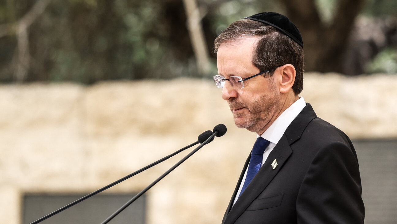 Israeli President Isaac Herzog addresses a ceremony commemorating Israel’s Remembrance Day for fallen soldiers, or Yom HaZikaron, at the Military Cemetery on Mount Herzl in Jerusalem on April 21.