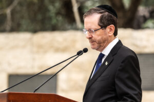 Israeli President Isaac Herzog addresses a ceremony commemorating Israel’s Remembrance Day for fallen soldiers, or Yom HaZikaron, at the Military Cemetery on Mount Herzl in Jerusalem on April 21.