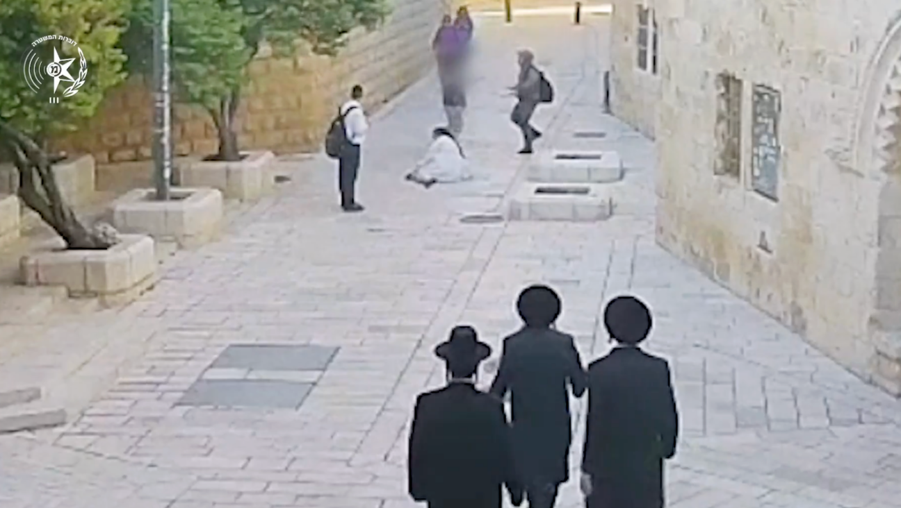 Surveillance footge shows a Catholic nun attacked on a street in Jerusalem on April 28, 2026. (Israeli Police/Screenshot)