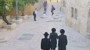 Surveillance footge shows a Catholic nun attacked on a street in Jerusalem on April 28, 2026. (Israeli Police/Screenshot)