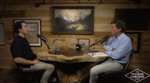 Tucker Carlson interviews Tyler Oliveira on May 8, 2026. (Screenshot)