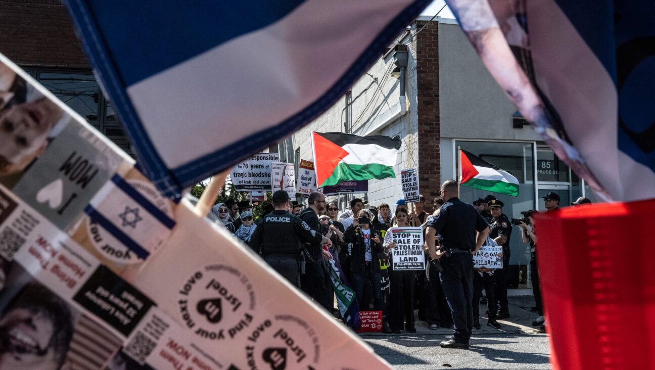 Pro-Israeli counter protesters face off with Pro-Palestinian demonstrators on Sept. 15, 2024 in Cedarhurst, New York. An Israeli real estate expo at a local synagogue brought out demonstrators on both sides of the issue.