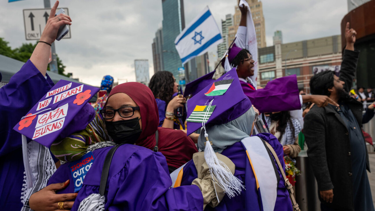 Police, supporters of Israel, and demonstrators in support of Palestinians gather outside Barclays Center for a graduation ceremony for Hunter College students on May 30, 2025.