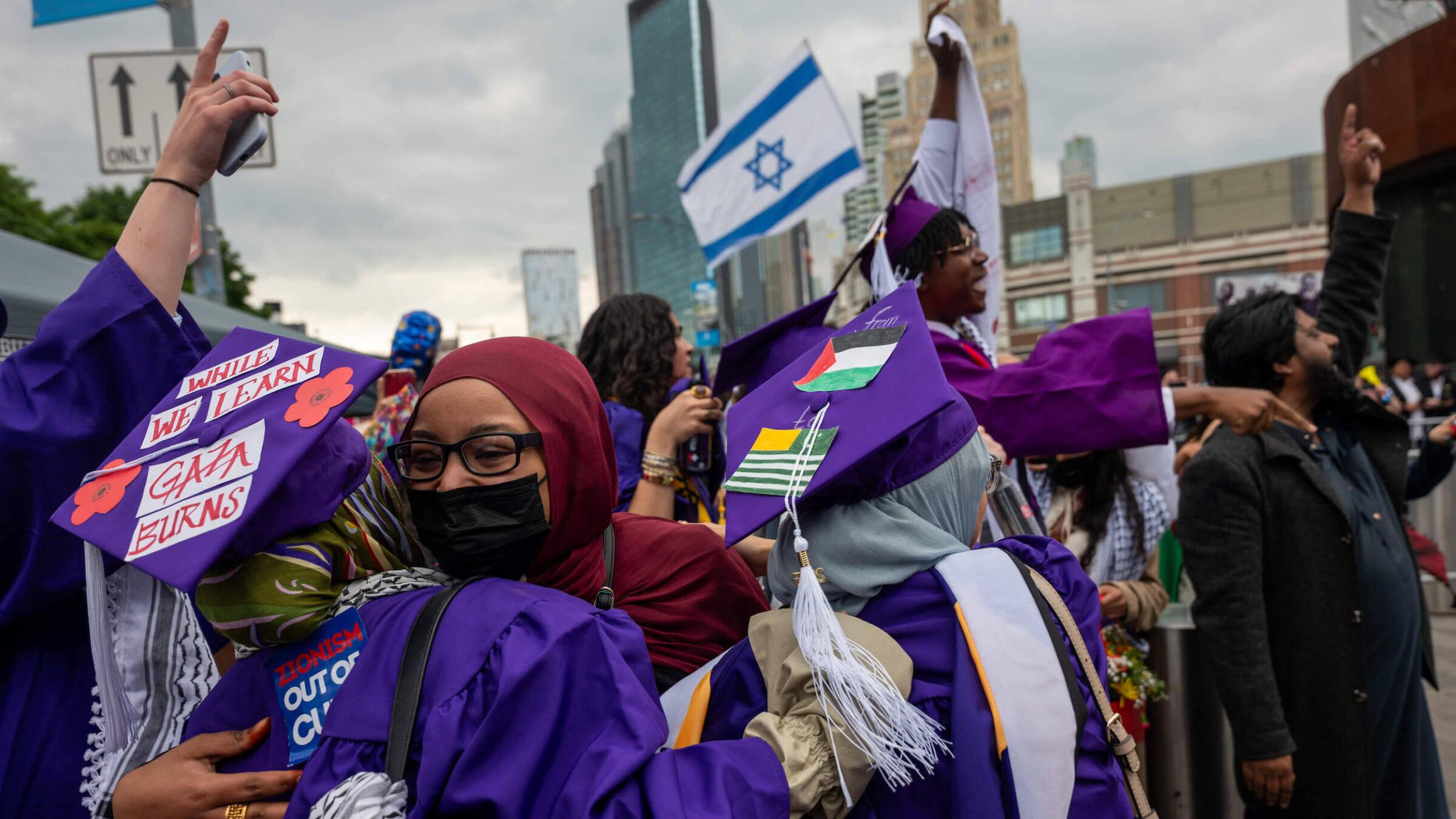 Police, supporters of Israel, and demonstrators in support of Palestinians gather outside Barclays Center for a graduation ceremony for Hunter College students on May 30, 2025.