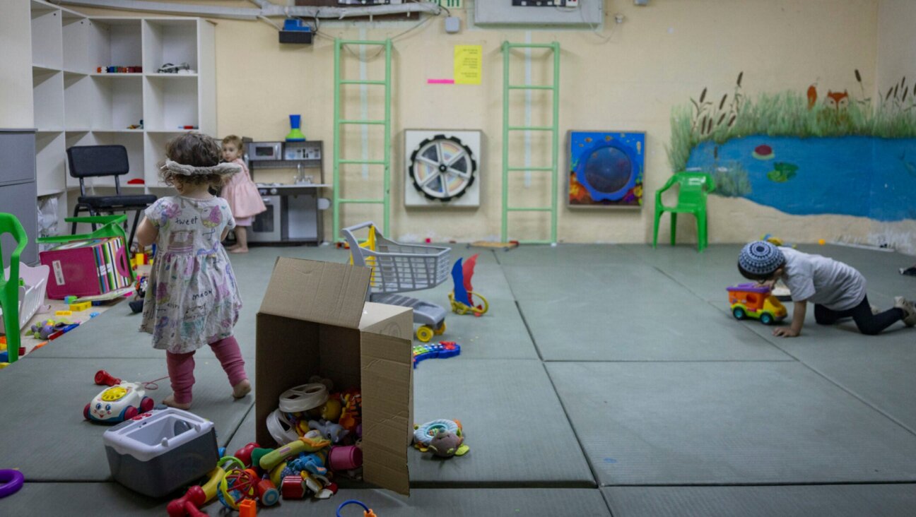 Children play in a public bomb shelter in the Nahlaot neighborhood of central Jerusalem, June 8, 2026. (Chaim Goldberg/Flash90)
