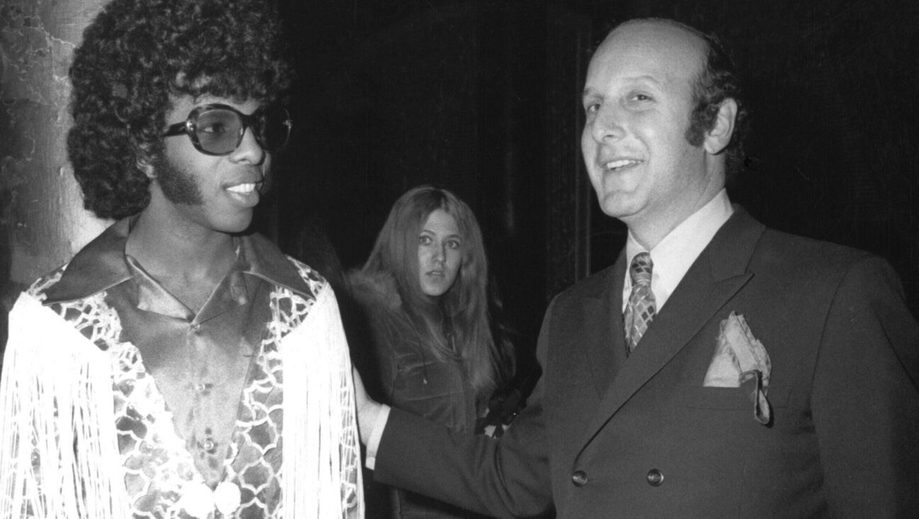 Clive Davis and Sly Stone in 1970.