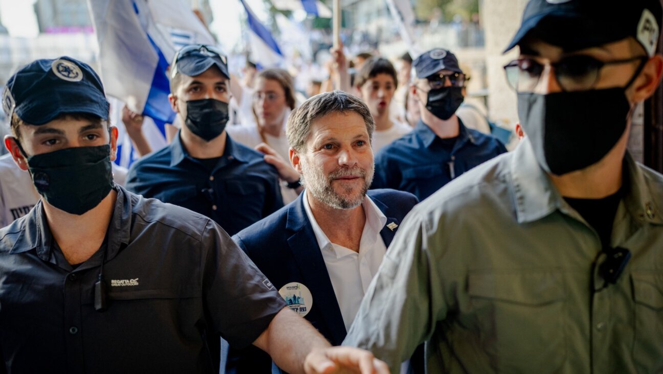 Israel’s Finance Minister Bezalel Smotrich takes part in the Jerusalem Day parade at the Damascus Gate in the old city of Jerusalem, May 14, 2026. The controversial annual march sees thousands of nationalist Israelis celebrate the capture of the formerly Jordanian-held east of the city during the Six-Day War in 1967. (Erik Marmor/Getty Images)