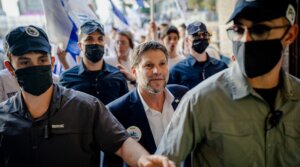 Israel’s Finance Minister Bezalel Smotrich takes part in the Jerusalem Day parade at the Damascus Gate in the old city of Jerusalem, May 14, 2026. The controversial annual march sees thousands of nationalist Israelis celebrate the capture of the formerly Jordanian-held east of the city during the Six-Day War in 1967. (Erik Marmor/Getty Images)
