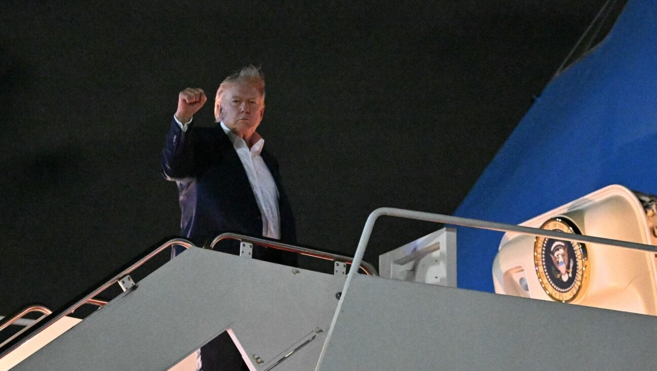 US President Donald Trump boards Air Force One on June 15, 2026, a day after announcing a deal to end the U.S.-Israel war on Iran. (Mandel Ngan / AFP via Getty Images)