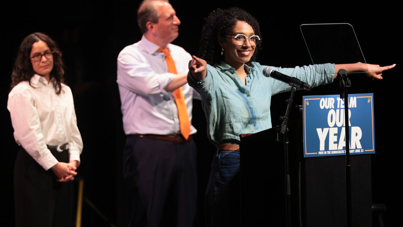 Darializa Avila Chevalier, right, joins Claire Valdez and Brad Lander at a campaign rally with Mayor Zohran Mamdani and Sen. Bernie Sanders on June 18.