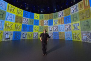 Rod Arad stands near the screen into the art installation 'Curtain Call.' London, 2016.