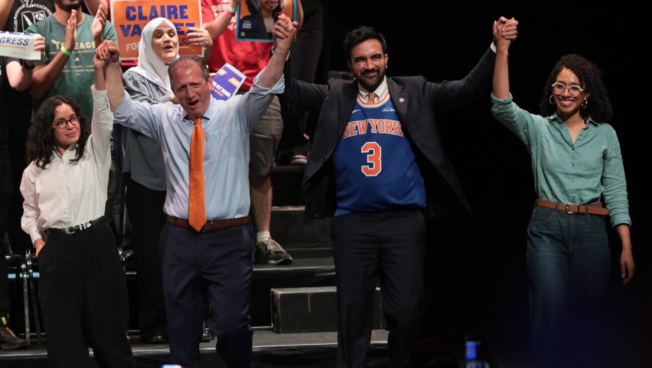 Candidate Claire Valdez, candidate Brad Lander, Mayor Zohran Mamdani and candidate Darializa Avila Chevalier raise their hands during a rally on June 18, 2026, in New York City.