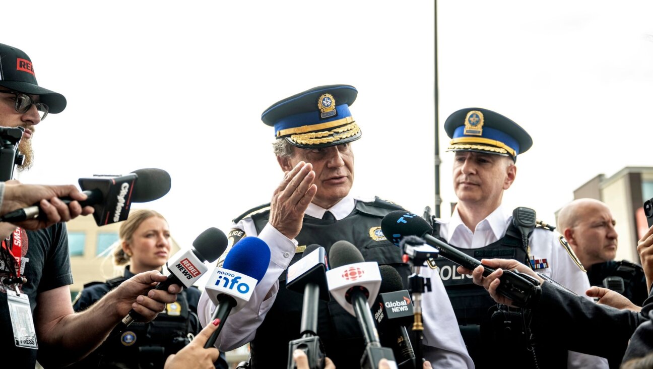 Police Chief Fady Dagher speaks to media during a press conference near the scene of an active shooter situation on June 22, 2026 in Montreal.